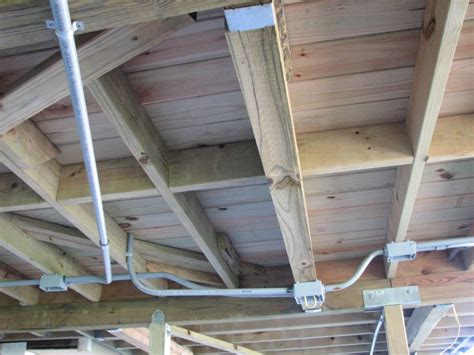 junction box access under deck|running electrical cable under deck.